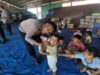 Polres Karo Berbagi Keceriaan, Anak-Anak Pengungsi Sinabung Dapat Bantuan Snack